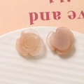 Detailed front and back views of matte peach resin rose charms for DIY jewelry making - Nude Pink