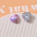 Macro detail of geometric heart-shaped iridescent beads with grid texture for DIY jewelry - Rose Red