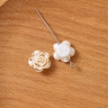 Close-up of pearl white rose beads with gold trim for DIY jewelry making and crafts - Small Rose Style