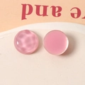 Detail of 16mm pink resin geometric charms with smooth and ripple textures for DIY jewelry - Rose Red