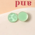 Detailed view of light green 16mm water ripple resin beads for DIY jewelry making - Green