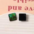 Macro shot of square resin earring charms with emerald foil and glossy black finish - Green Square