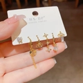 Goldenes 6-teiliges Ohrring-Set mit Stern, Herz und Planeten-Motiven und weißen Kristallen - Strass Stern Planet Kombination (J04-) / Gold