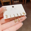 Handgehaltenes 6er-Set goldene Stern- und Mond-Ohrringe mit Zirkonia auf Displaykarte - Zirkonia Stern Planet Kombination (36#) / Gold