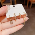 Luxurious four-piece gold zircon earring set with asymmetrical square and tassel designs - Gold Style