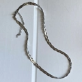 Detailed view of silver triple-layered braided snake chain with lobster clasp and extender - Steel Color 3 Layers