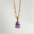 18k gold plated stainless steel necklace featuring a purple pear cut cubic zirconia stone - June