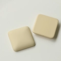 Detailed macro view of cream square matte resin patches for DIY jewelry making - Off-white Square Style