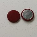Close-up of dark red velvet covered buttons with silver metal back for DIY crafts - Red