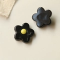Detail of DIY black resin five-petal flower charms with yellow center for crafts - Black