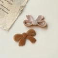 Detail of brown flocked bow DIY accessory showing texture and purple plastic back - Light Brown