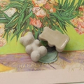Detailed view of flocked and glossy resin bear charms for DIY jewelry and phone cases - Milk Tea