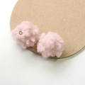 Detail of pink faux fur pompoms with gold metal base for DIY jewelry making - Pink