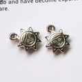 Silver vintage sun charms with face relief and star details for DIY jewelry making - Small Sun