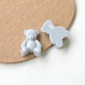 Detailed macro view of flatback light gray resin bear charms for DIY jewelry making - Light Gray