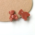 Macro shot of cute reddish-brown resin bear charms for DIY jewelry and phone accessories - Wine Red