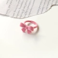 Pink flocked bow open ring featuring a soft minimalist design on vintage paper background - Peach Pink Bowknot