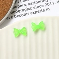 Nœuds en résine vert fluo phosphorescents pour le nail art et accessoires faits main - Vert