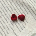 Close-up of red flocked flower DIY accessories with velvet texture on linen fabric - Small Three Petal Flower
