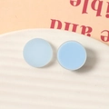Matte light blue round resin studs for DIY jewelry on a white wavy tray - Round Blue