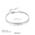 Gepolijste zilveren roestvrijstalen kettingarmband met drie fonkelende zirkoontjes - Armband 17+3cm / Zilver