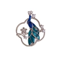 Elegante spilla a pavone in argento con smalto blu e cristalli bianchi lucidi - Argento