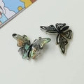 Detail of hollow butterfly acetate charms with marble texture for DIY hair accessories - Dark Green