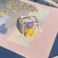 Chunky transparent resin ring featuring a cute purple and yellow teddy bear charm - Purple & Yellow