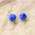 Detailed macro view of blue glass lily of the valley beads for DIY jewelry making - 1 Piece / Blue