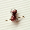 Macro detail of 16mm glass beads with purple spiral pattern and gold metal pin - Purple And Red Swirl Style (45#6)