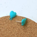 Close-up of tiffany blue heart stud earrings with a small loop for DIY jewelry projects - Lake Blue