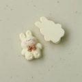 Close-up of cute rabbit resin accessories for DIY jewelry with detailed front and back - Creamy White Rabbit