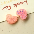 Detail of pink heart DIY resin accessories with glitter sequins and crystal texture - Pink