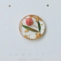 Round resin pendant with red dried flower and gold foil flakes on white card - Single Patch / Pink