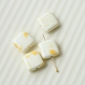 Close-up of square ceramic beads with yellow ink splash patterns for DIY jewelry making - Yellow (114#)