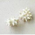 Detail of cream white 3D urchin style resin charms for DIY jewelry and crafts - White