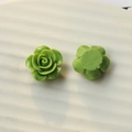 Macro detail of green resin rose charm showing 3D petals and a flat back for DIY - Grass Green