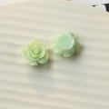 Macro detail showing front and flat back of light green resin rose DIY accessory flower - Mint Green