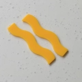 Detailansicht von gelben gewellten Acryl-Anhängern für DIY-Schmuck und Bastelbedarf - Gelbe Welle