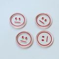 Detail of four transparent round resin charms with red smiley face prints for DIY jewelry - Flat Face (Red One) / Red