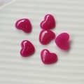 Close-up of 12mm fluorescent rose red resin heart charms for DIY jewelry making - Purple Heart