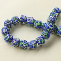 Close-up of handmade blue Millefiori glass beads with 3D floral and leaf patterns - 1 Piece/Pack / 57# Blue Purple