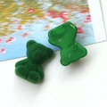 Dettaglio di un orsetto floccato verde per fai-da-te con retro liscio e consistenza - Verde Scuro