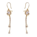 Élégantes boucles d'oreilles nœud dorées avec glands en cristal et micro-pavé pour femme - Gland de Calebasse Entièrement en Strass / Or