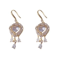 Boucles d'oreilles cœur dorées de luxe avec cristaux, perles et franges en gouttelettes - Boucles d'Oreilles Gland Strass Cœur Doré