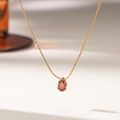 Elegant 18K gold-plated titanium necklace with a pear-cut red gemstone teardrop pendant - Water Drop Style / Gold Red Zirconia (XKN0080)
