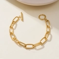 Λεπτομερής λήψη χρυσής αλυσίδας 18K από ανοξείδωτο ατσάλι με κούμπωμα OT για κομψή εμφάνιση - Βραχιόλι με Κούμπωμα Toggle OT
