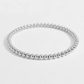 Detailansicht des polierten elastischen Perlenarmbands aus Edelstahl mit 18K Vergoldung - 4mm / Silber