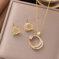 Gold star and moon jewelry set with sparkling zircon inlays on elegant display - Zirconia Star Moon Jewelry Set (8233) / Gold