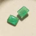 Close-up of translucent green resin rectangle charms with embedded gold wire textures - Large Rectangular Green